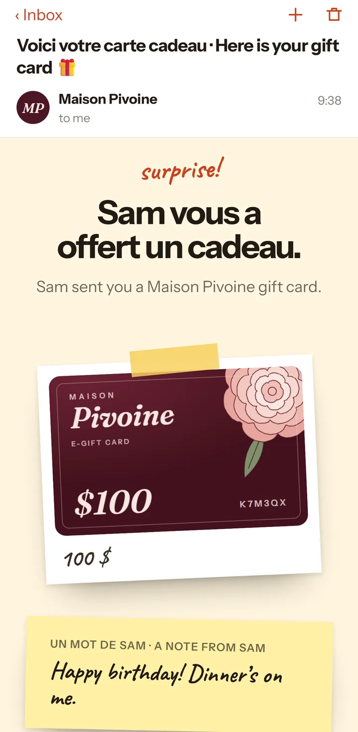 A guest’s e-gift card email on a phone: the Maison Pivoine card as a taped polaroid, with code K7M3QX and a note from the buyer